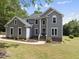 Inviting two-story home with a well-maintained lawn and charming curb appeal at 7116 Incline Dr, Wake Forest, NC 27587
