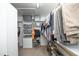 This walk-in closet has shelving and hanging racks to maximize storage potential at 74 Pedernales Dr, Smithfield, NC 27577