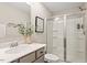 Clean bathroom featuring a glass door shower, and modern fixtures at 7729 Calcutta Dr, Willow Springs, NC 27592