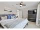 Comfortable bedroom featuring a large bed, a TV and neutral decor at 7729 Calcutta Dr, Willow Springs, NC 27592