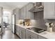 Well-designed kitchen with stainless appliances, wine rack, and ample counter space at 7729 Calcutta Dr, Willow Springs, NC 27592