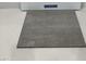 Close up view of gray flooring material samples at 85 Cordoba Dr, Franklinton, NC 27525