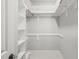 Spacious walk-in closet with built-in shelves and ample storage space at 8524 Society Pl, Raleigh, NC 27615