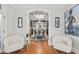 Elegant dining area with stylish chairs, modern table, and direct access to exterior patio at 8524 Society Pl, Raleigh, NC 27615