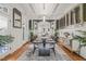 Formal dining room featuring a stylish chandelier, wine rack, and view to kitchen at 8524 Society Pl, Raleigh, NC 27615