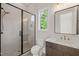 Modern bathroom with glass shower, marble countertop, and sleek fixtures at 9004 Meadow Pointe Ct, Wake Forest, NC 27587