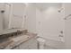 Bright bathroom with carrara countertops, a large mirror, and a bathtub at 9004 Meadow Pointe Ct, Wake Forest, NC 27587