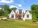 Attractive home featuring meticulous landscaping and a large lawn at 9004 Meadow Pointe Ct, Wake Forest, NC 27587