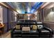 Luxury home theater includes tiered seating, a popcorn machine, and a starry night ceiling at 901 Edgewater Dr, Garner, NC 27529