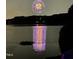 Scenic lake view with fireworks reflecting in the water at 901 Edgewater Dr, Garner, NC 27529