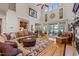 Inviting living room with high ceilings, large windows, and a view of the water at 901 Edgewater Dr, Garner, NC 27529