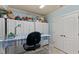 Craft office space featuring a large work table and ample storage cabinets at 901 Edgewater Dr, Garner, NC 27529