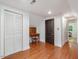Attic room with wooden floors and a desk area at 967 Bynum Rd, Pittsboro, NC 27312