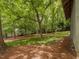 Expansive backyard with mature trees, ideal for recreation and relaxing at 967 Bynum Rd, Pittsboro, NC 27312
