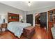 Charming bedroom with hardwood floors, decorative furniture, and natural light at 967 Bynum Rd, Pittsboro, NC 27312