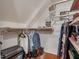 Attic closet featuring custom shelving and storage solutions at 967 Bynum Rd, Pittsboro, NC 27312
