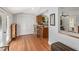 Bright dining area with hardwood floors and open layout, connecting seamlessly to the kitchen, perfect for entertaining guests at 967 Bynum Rd, Pittsboro, NC 27312
