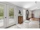 Elegant foyer with tile flooring, stylish accents, and ample natural light welcomes guests with its sophisticated charm at 967 Bynum Rd, Pittsboro, NC 27312