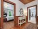 Inviting hallway with wood accents, leading to a bedroom, showcasing the home's architectural details at 967 Bynum Rd, Pittsboro, NC 27312
