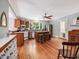 Spacious kitchen featuring wood cabinets, stainless steel appliances, and a center island at 967 Bynum Rd, Pittsboro, NC 27312