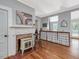 Charming living room with a fireplace, hardwood floors, and stylish decor creates a warm, inviting atmosphere at 967 Bynum Rd, Pittsboro, NC 27312