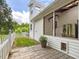 Exterior of home with stone pathway and screened porch at 967 Bynum Rd, Pittsboro, NC 27312