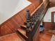 Wood stairway featuring craftsman style woodwork, leading to upper levels at 967 Bynum Rd, Pittsboro, NC 27312