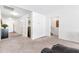 Finished basement with neutral carpet, offering versatile space for recreation or storage at 1004 Gold Cir, Mebane, NC 27302