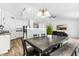 Open-concept dining area next to the kitchen and living room, perfect for entertaining at 1004 Gold Cir, Mebane, NC 27302