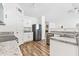 Well-lit kitchen featuring granite countertops and stainless steel appliances at 1004 Gold Cir, Mebane, NC 27302
