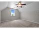 Spacious carpeted bedroom featuring a ceiling fan and a window at 105 Seminole Fields Dr, Broadway, NC 27505