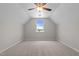 Spacious carpeted bedroom with a ceiling fan and a window at 105 Seminole Fields Dr, Broadway, NC 27505