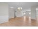 Spacious open-concept living area with wood floors and ample natural light at 105 Seminole Fields Dr, Broadway, NC 27505
