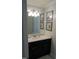Bathroom with a vanity, modern lighting, and decorative wall art at 106 N Duelling Oaks Dr, Chapel Hill, NC 27517