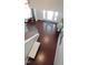 Open foyer featuring hardwood floors, staircase, and stylish decor, offering a grand entrance at 106 N Duelling Oaks Dr, Chapel Hill, NC 27517