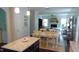Kitchen with granite countertops and a view of the dining and living areas at 106 N Duelling Oaks Dr, Chapel Hill, NC 27517
