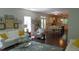 Bright living room with comfortable seating, natural light, and easy access to the kitchen at 106 N Duelling Oaks Dr, Chapel Hill, NC 27517