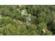 Aerial shot of property nestled among mature trees in a quiet neighborhood at 109 Rustler Rd, Louisburg, NC 27549