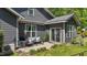 Outdoor patio with comfortable seating, perfect for relaxing and entertaining at 109 Rustler Rd, Louisburg, NC 27549