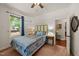 Cozy bedroom with a ceiling fan and a window at 109 Rustler Rd, Louisburg, NC 27549