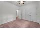 Carpeted bedroom with ceiling fan and closet at 109 Rustler Rd, Louisburg, NC 27549