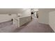 Bonus room featuring carpeted floors with a view of a separate living space at 109 Rustler Rd, Louisburg, NC 27549