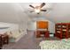 Bonus room with carpet features a desk, sofa, and window at 109 Rustler Rd, Louisburg, NC 27549