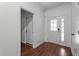 Bright foyer with hardwood floors and white trim, leading to the rest of the home at 109 Rustler Rd, Louisburg, NC 27549