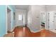 Inviting foyer with hardwood floors and stylish front door at 109 Rustler Rd, Louisburg, NC 27549