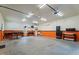 Spacious garage interior with concrete flooring and ample workspace and storage area at 109 Rustler Rd, Louisburg, NC 27549