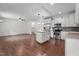 Modern kitchen featuring an island, stainless steel appliances, and an open layout at 109 Rustler Rd, Louisburg, NC 27549