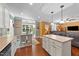 The kitchen and dining room are connected to the living room to make an open concept and inviting space at 109 Rustler Rd, Louisburg, NC 27549