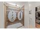 The shower features a glass door and shower head at 109 Rustler Rd, Louisburg, NC 27549