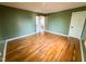 Bedroom with wood floors, neutral color scheme, and a bright and open feel at 1100 Chester St, Durham, NC 27701
